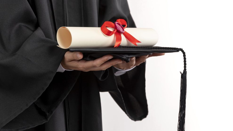 close-up-woman-with-graduation-diploma